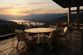 Alpine retreat, 3D rendering showcases wooden tables, chairs, misty view