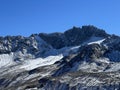 Alpine rocky mountain peak Piz Vadret (3229 m) in the massif of the Albula Alps above the Vardet da Grialetsch glacier