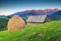 Alpine rural landscape with old wooden barn,Transylvania,Romania,Europe Royalty Free Stock Photo