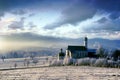 Alpine scenery with church in the frosty morning Royalty Free Stock Photo
