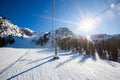 Alpine ski chair lift and slope Royalty Free Stock Photo