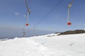 Alpine ski lift at Etna ski resort. Sicily, Italy. Royalty Free Stock Photo