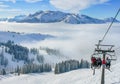 Alpine ski slope mountain winter panorama with ski lift Royalty Free Stock Photo