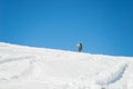 Alpine ski touring towards the summit Royalty Free Stock Photo