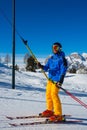 Alpine skier with T-bar lift