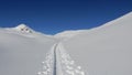 Alpine skiing footsteps Royalty Free Stock Photo