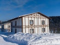 Alpine-style hotel in the Gornaya Salanga ski resort. Winter sunny day Royalty Free Stock Photo