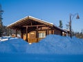 Alpine-style hotel in the ski resort Gornaya Salanga. Chalet in the snow