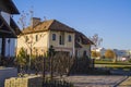 Alpine style house with court. parking and fence Royalty Free Stock Photo