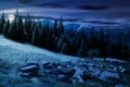 Alpine summer landscape composite at night in full moon light