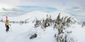 Alpine touring skier in winter mountain