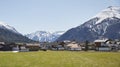 Alpine village road in the Austrian Alps - Stock Photo Royalty Free Stock Photo