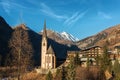 Alpine village with beautiful pilgrimage church and blue sky Royalty Free Stock Photo