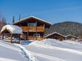 Alpine Village in the ski resort Mountain Salanga. Winter sunny day Royalty Free Stock Photo