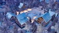 Alpine village at snowfall winter night top view Royalty Free Stock Photo