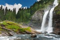 Alpine waterfall in mountain forest