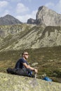 Alpinist meditates according to the meaning of life Royalty Free Stock Photo