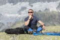 Alpinist meditates according to the meaning of life Royalty Free Stock Photo