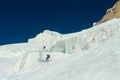 Alpinist team on the glacier at high altitude snow mountains