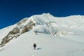 Alpinist team on the glacier at high altitude snow mountains