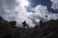 Alpinist silhouette in tofane dolomites mountains panorama