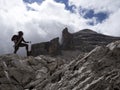 Alpinist silhouette in tofane dolomites mountains panorama