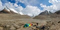 Alpinists climbing bivouac high mountain peaks snow and ice panorama landscape