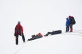 Alpinists resting on a glacier