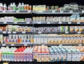 Alpro Soya milk and yogurt products on shelf of supermarket.