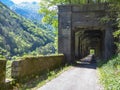 Alps Adria - Ciclovia Alpe Adria bike lane entering one of the many tunnels on the route, Val Canale valley, Udine