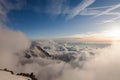 Alps in the clouds during sunset Royalty Free Stock Photo