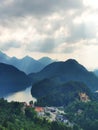 Alps and lakes in a summer day in Germany. Taken from the hill next to Neuschwanstein castle. View of the Hohenschwangau castle, Royalty Free Stock Photo