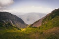 Alps mountain meadow tranquil summer view. Mountain valley village landscape summer. Mountain village view. Village in mountains. Royalty Free Stock Photo