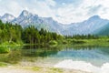 Alps mountains and lake in Almsee in Austria