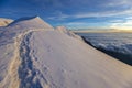 Alps snow mountain ridge above the clouds Royalty Free Stock Photo