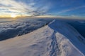 Alps snow mountain ridge above the clouds Royalty Free Stock Photo