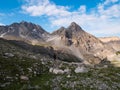 The Alps at sunrise. Colorful sky majestic peaks, dramatic valleys, rocky mountains. Expansive view from above. Royalty Free Stock Photo