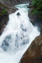 Alps waterfall summer view Royalty Free Stock Photo