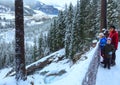 Alps waterfall winter view and family Royalty Free Stock Photo