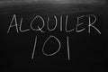 Alquiler 101 On A Blackboard. Translation: Renting 101 Royalty Free Stock Photo