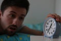 Alseep Man Turns off Alarm