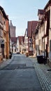 ALSFELD, GERMANY - JULY 20, 2024: View to the old city buildings. Charming narrow street lined with traditional houses