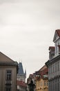 Old Town Hall tower, a clock tower, in Prague, Czech Republic, surrounded by the facades of the narrow streets of Old Town. Royalty Free Stock Photo