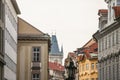 Old Town Hall tower, a clock tower, in Prague, Czech Republic, taken from the narrow streets of Old Town. Royalty Free Stock Photo