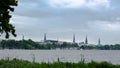 Alster Lake, Hamburg. Visible five towers in the city. Royalty Free Stock Photo