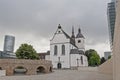 Alt Saint Heribert church, and modern officebuilding in Cologne