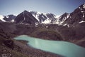 Altai forest reflect on the lake. beautiful landscape in morning time with warm tone. Beautiful calm landscape in the mountains Royalty Free Stock Photo