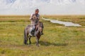Altai, Mongolia - June 14, 2017: Horseback in the Mongolian landscape. Altai, Mongolian valley view