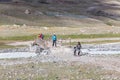 Altai, Mongolia - June 14, 2019: Mongolian children show tourists local attractions