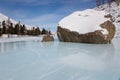 Altai mountain frozen lake with big stones